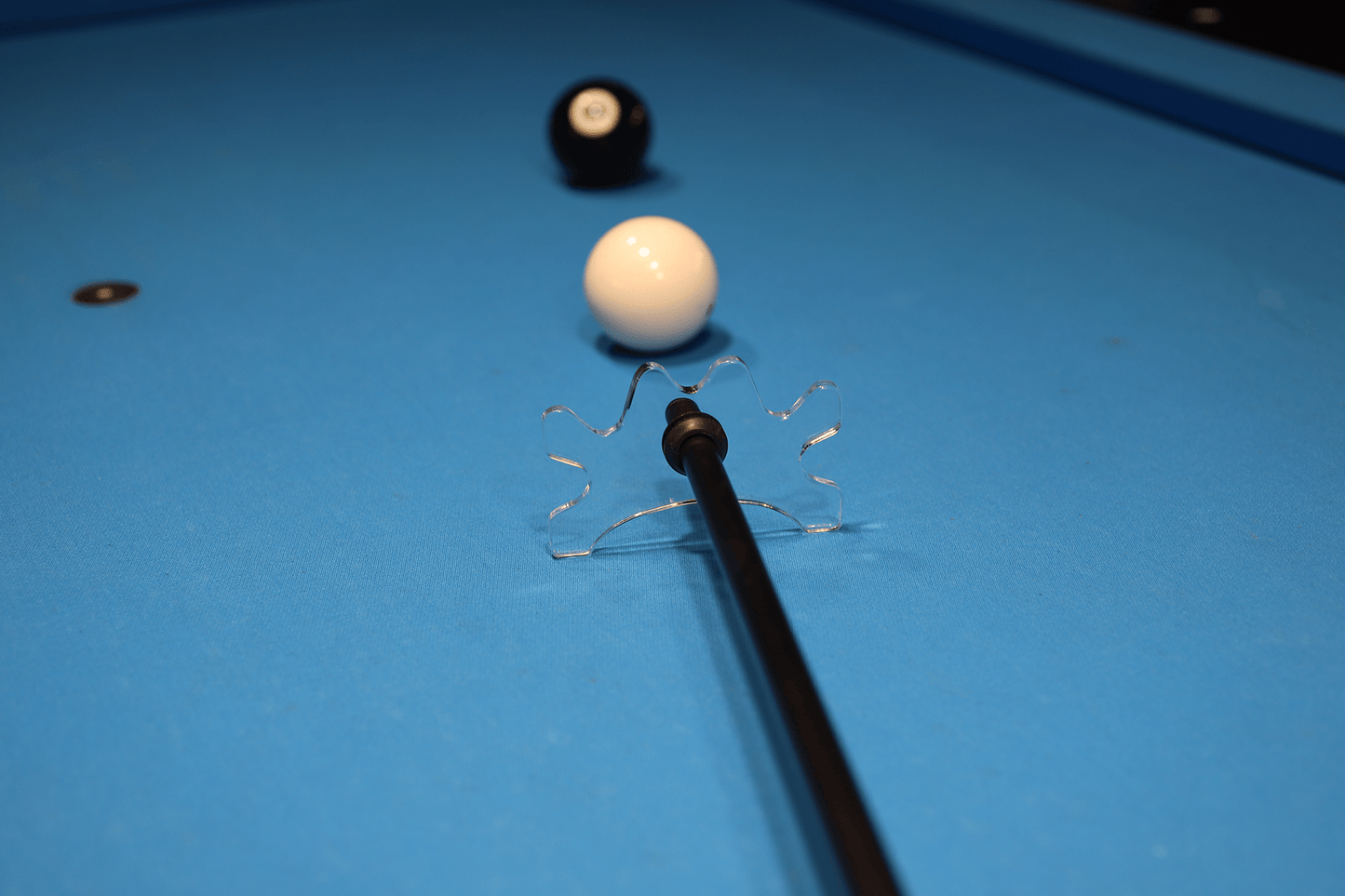 Multi-slot bridge lined up on cue ball