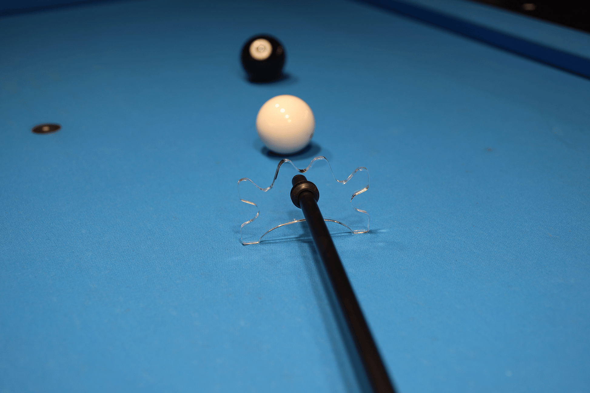Multi-slot bridge lined up on cue ball