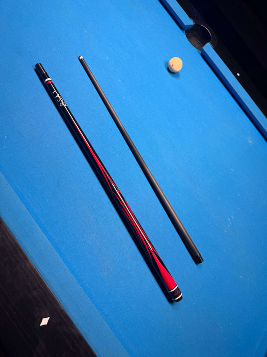Beatstix carbon fiber shaft with butt having red graphics that look like swords clashing