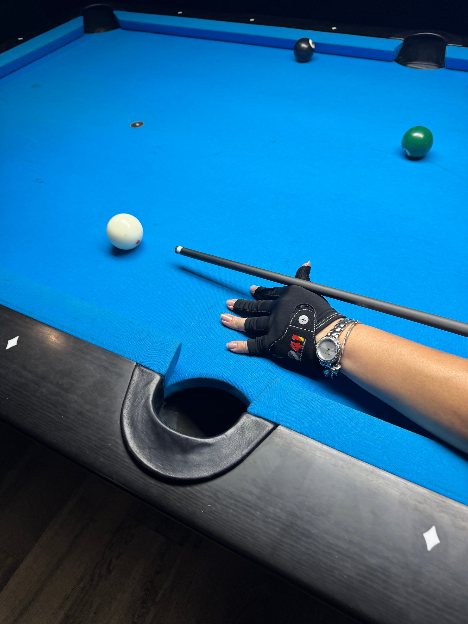 241Gloves in action on pool table